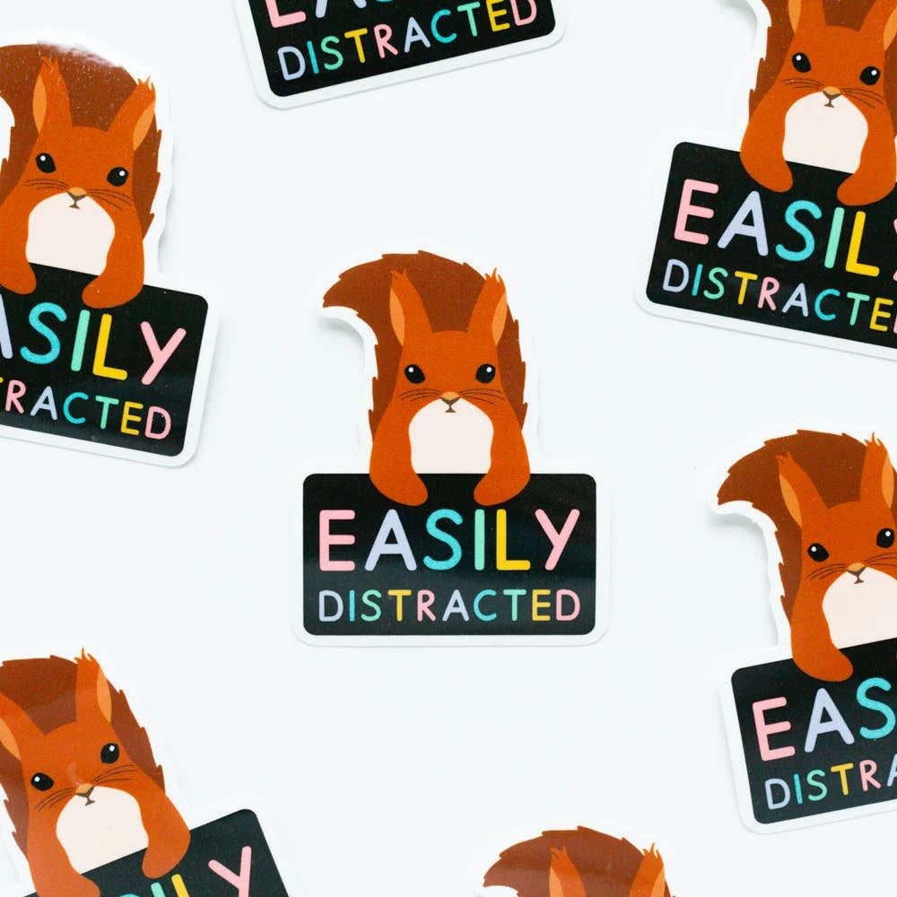 Squirrel holding a sign saying Easily distracted. By Jeff and the Squirrel. Neurodivergent. ADHD. Sticker